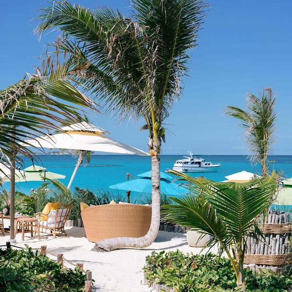 On Friday, Courtney and Tai brought the celebration to Rose Island and Kerzi Beach. From a private dock, guests boarded ...